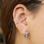 Candongas en plata ley 925 con ojos turcos y circones