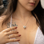 Collar corazón con alas en plata ley 925 certificada