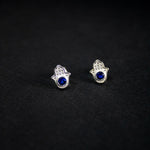 Topitos mano de hamsa en plata ley 925 y circones transparentes y azul