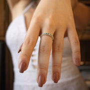 Anillo tipo churumbela  en plata ley 925 con cristales de circón verde