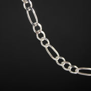 Cadena tipo fígaro 3x1 de 5mm en plata ley 925 certificada