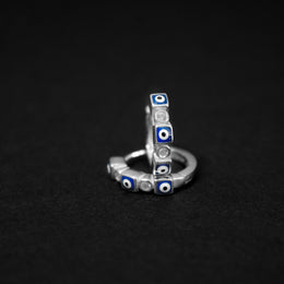 Candongas en plata ley 925 con ojos turcos y circones