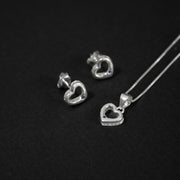 Conjunto de collar y topitos de corazón con cristales de circón en plata ley 925