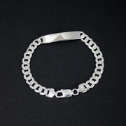 Pulsera en plata ley 925 italiana con tejido cubano de 7 mm y placa para grabar 