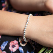 Pulsera en hilo terlenka con cuentas bolitas de plata ley 925