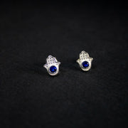 Topitos mano de hamsa en plata ley 925 y circones transparentes y azul